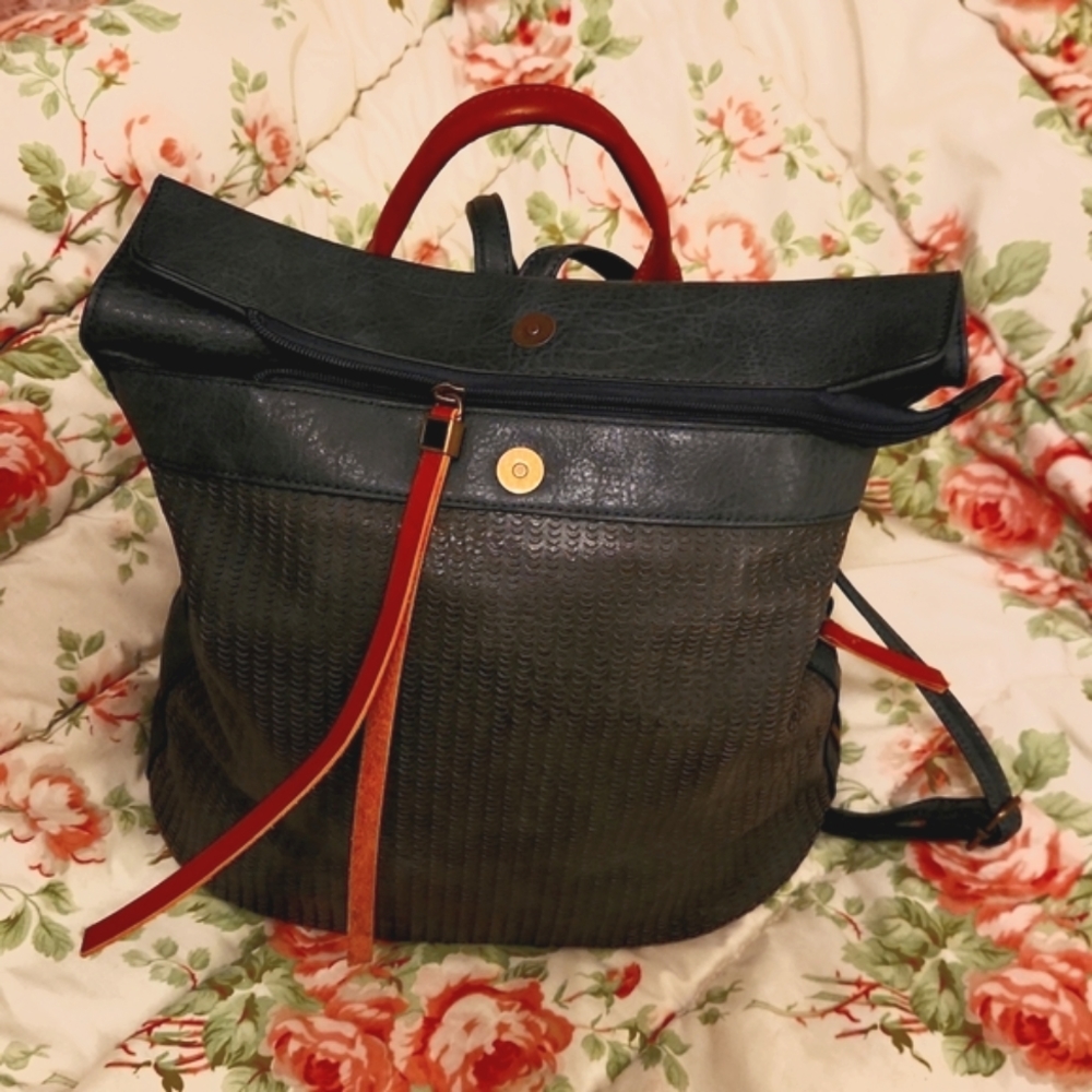 Beautiful blue leather backpack purse